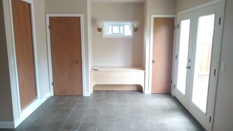 Garage conversion with closets and bench