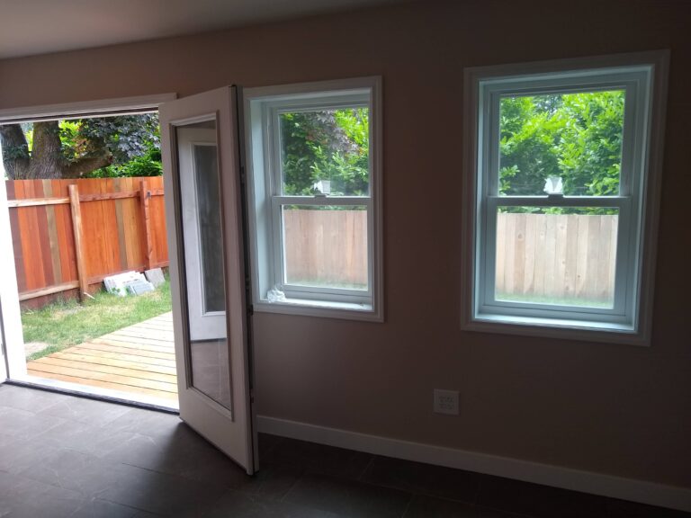 Single-hung windows installed in garage conversion
